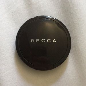 BECCA shimmering skin perfector in the shade Opal